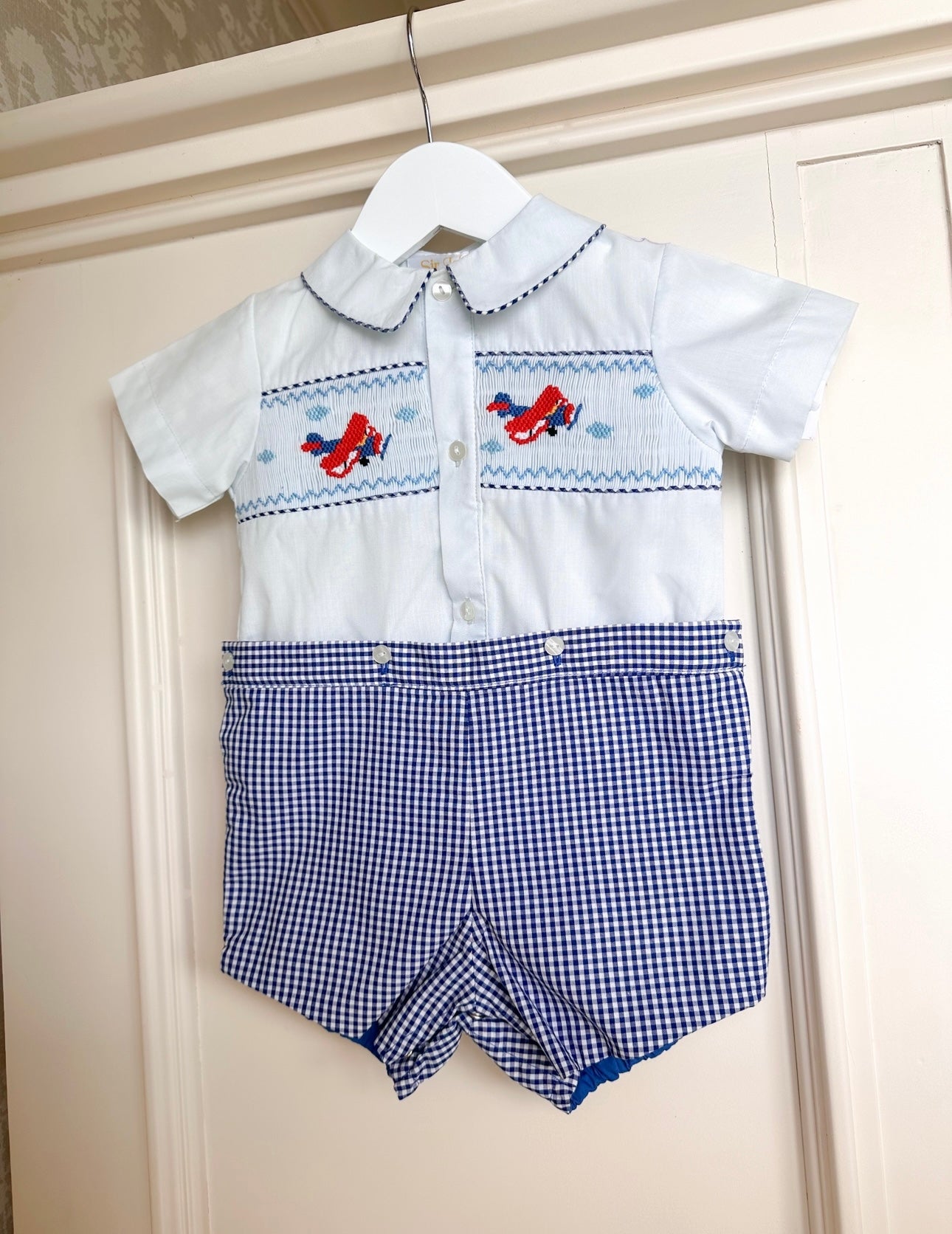 Blue Airplane Hand-Smocked Button-On Romper